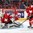 MONTREAL, CANADA - DECEMBER 30: Switzerland 's Joren van Pottelgerghe #30 makes the blocker save while teammate Roger Karrer #4 and Denmark's Mathias From #20 look on during preliminary round action at the 2017 IIHF World Junior Championship. (Photo by Francois Laplante/HHOF-IIHF Images)

